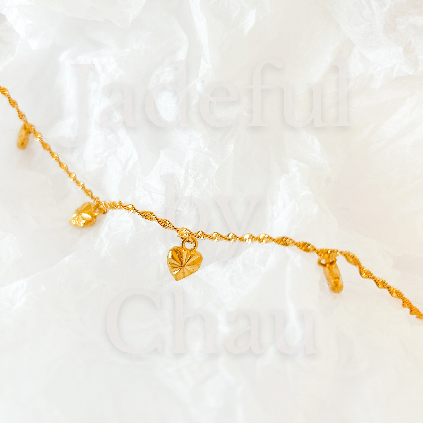 TWISTED LOVE Armkette – Gold