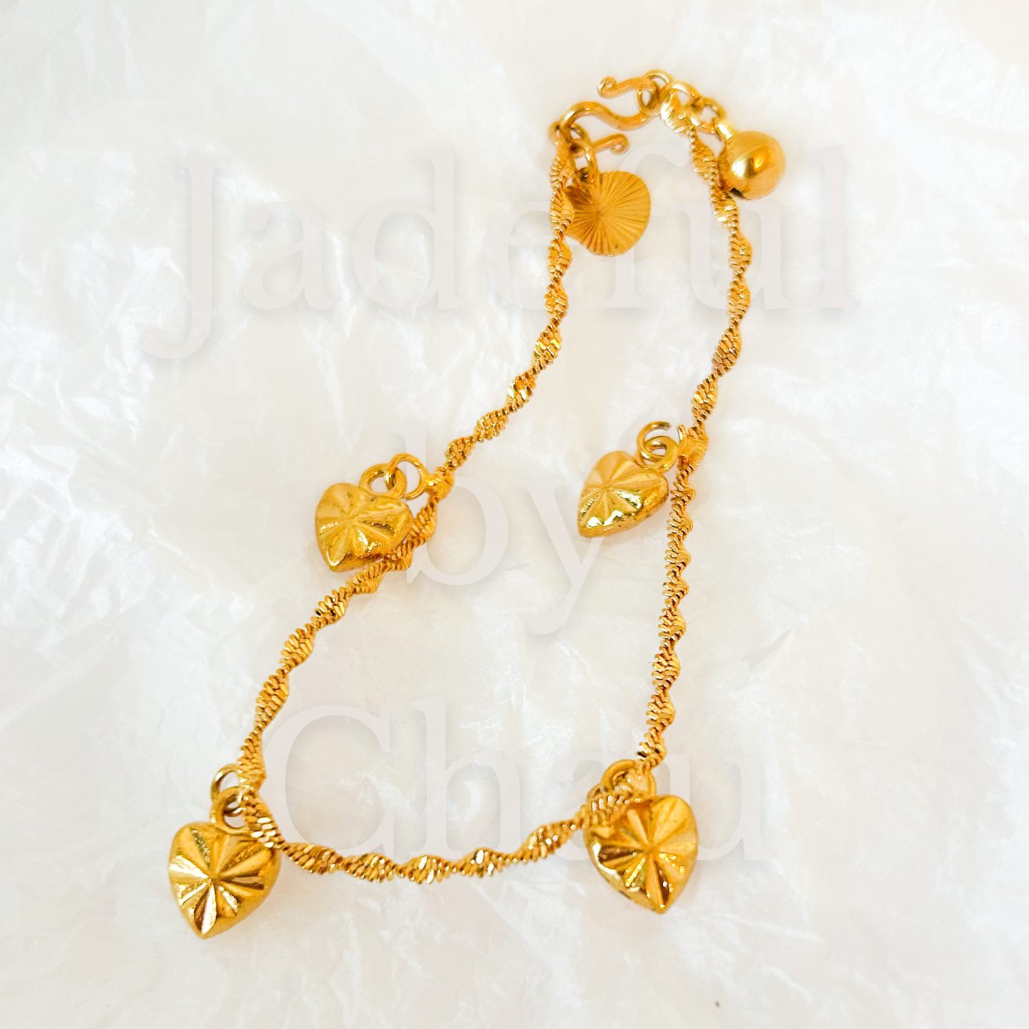 TWISTED LOVE Armkette – Gold