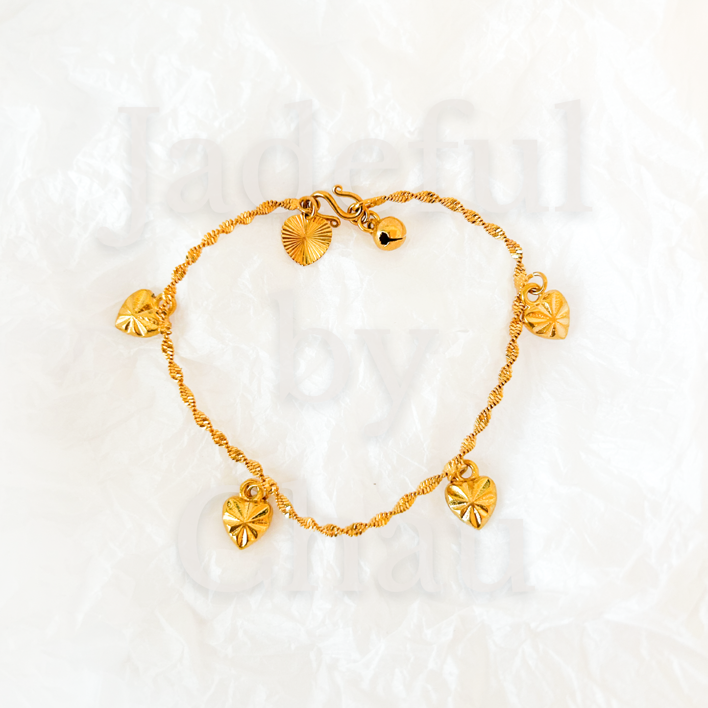 TWISTED LOVE Armkette – Gold