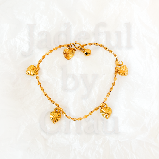 TWISTED LOVE Armkette – Gold